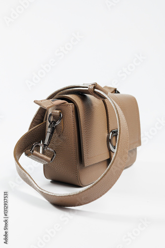 Obraz na płótnie Classic brown leather women's bag on a white background. Women's accessory. Ladies handbag w salonie