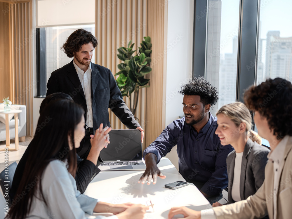 Diverse Business Team Collaborating in Modern Office Environment