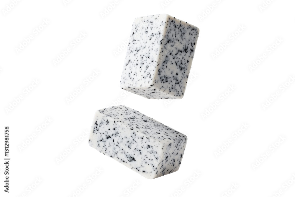 Two white and black cubes of soap are floating in the air, isolated Two white and black cubes of soap are floating in the air, isolated