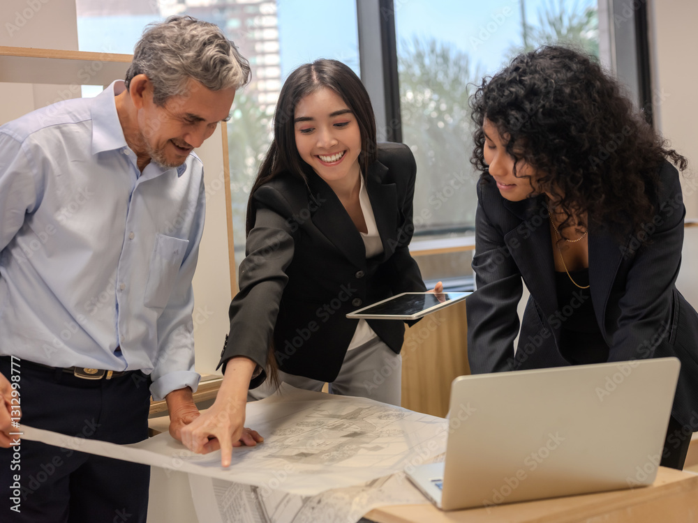 Business team collaborating on project strategy in office meeting