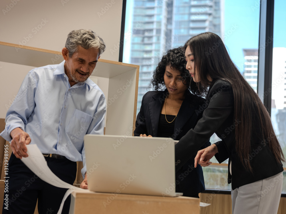 Coworkers Collaborating on a Business Presentation in the Office room
