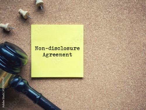 Non disclosure agreement text with copy space background. Also known as NDA. Stock photo.
