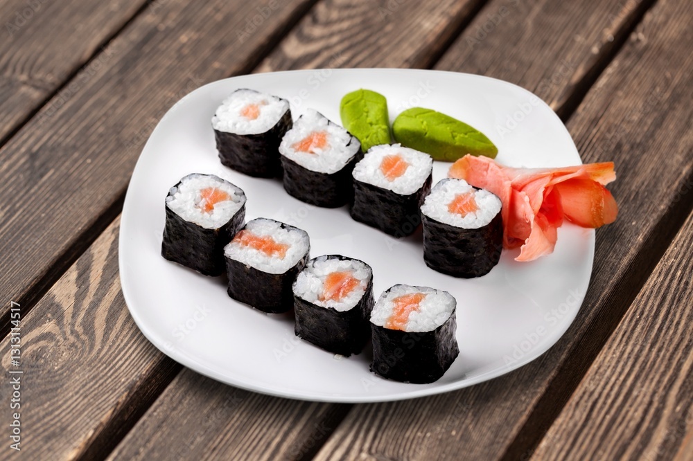 Food photography of tasty fresh sushi dish with decoration Food photography of tasty fresh sushi dish with decoration