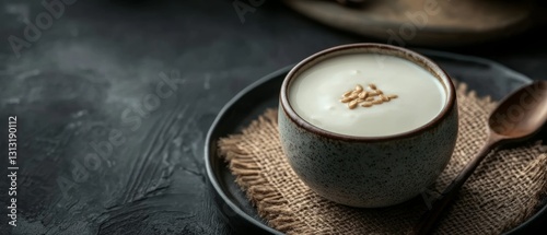a jug of yogurt with brown mat
