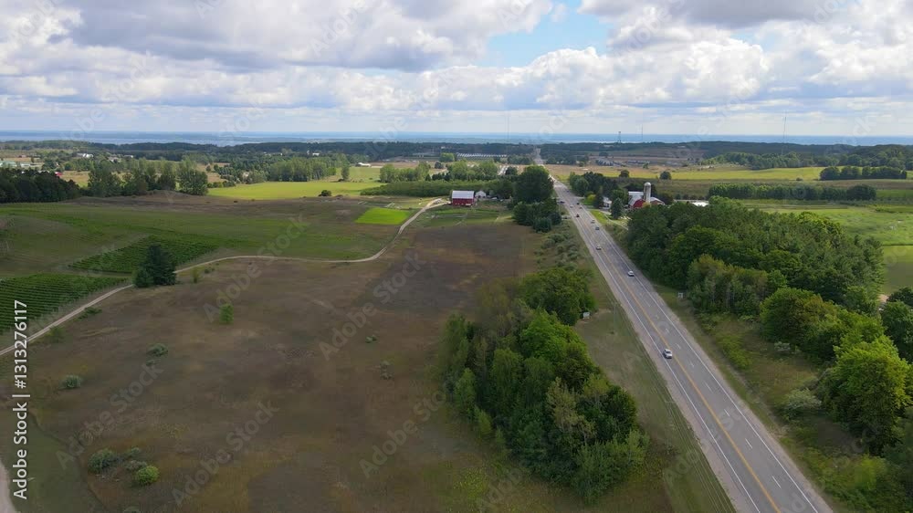 Green countryside landscape and road in Michigan, aerial view Green countryside landscape and road in Michigan, aerial view