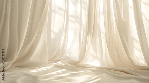 Light streams through sheer flowing curtains with shadows from branches
