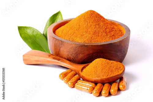 Turmeric powder in capsules, turmeric powder in wooden spoons, turmeric powder in wooden cups With leaves in the background. isolated on white background.