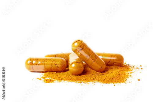 Turmeric powder in capsules. isolated on white background.