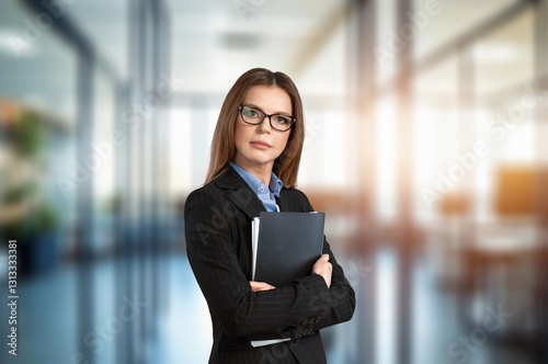 Happy confident professional business woman in office