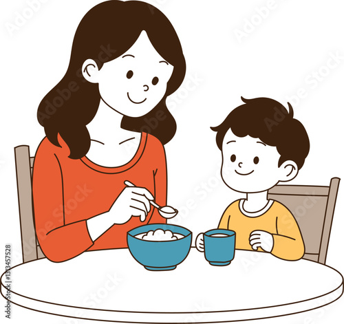 The mother is helping the child eat.