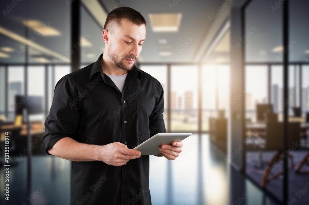 Businessman portrait hold tablet computer in office Businessman portrait hold tablet computer in office