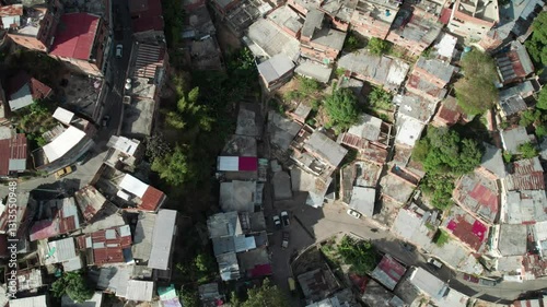The petare neighborhood in miranda with a moving drone shot over the rooftops, aerial view