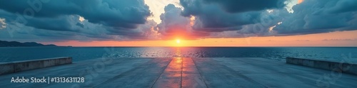 Vast empty concrete  moody ocean dusk  dramatic clouds    stillness   blue   weathered