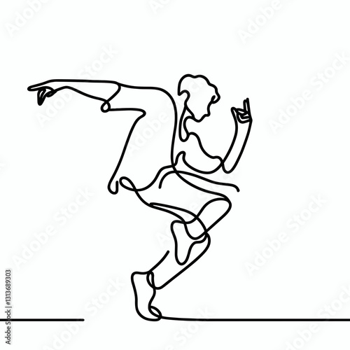 Energetic young man dancing playfully with a carefree attitude against a minimalist background