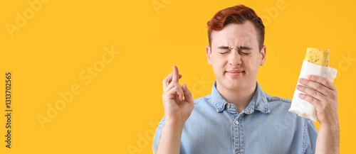 Young man with tasty sandwi...