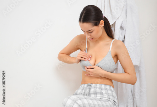 Beautiful young woman check...