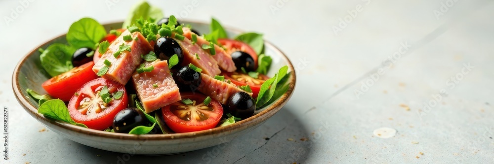 Vibrant Nicoise salad with tuna, olives, tomatoes, & mixed greens , fresh, cooking Vibrant Nicoise salad with tuna, olives, tomatoes, & mixed greens , fresh, cooking