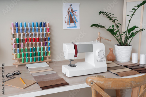 Tailor's workplace with sew...