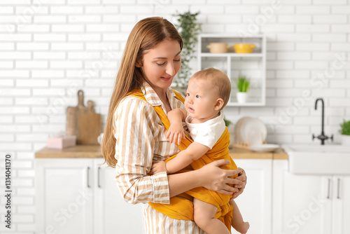 Young mother with little ba...
