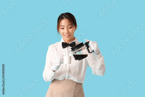 Young Asian smiling waitres...