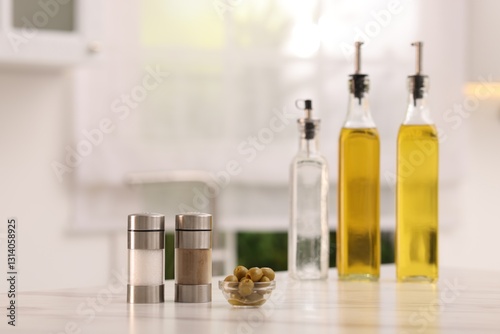 Wallpaper Mural Salad dressings, spices and olives on table in kitchen. Space for text Torontodigital.ca