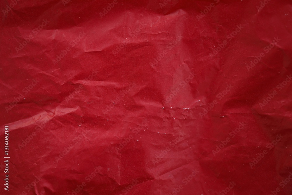 Obraz premium Texture of Red plastic bag smooth crumpled surface