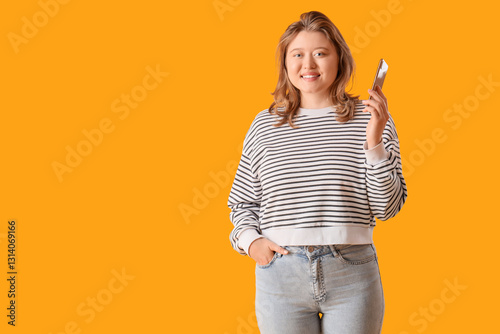 Young woman using mobile ph...
