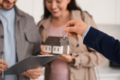 Male realtor with key again...
