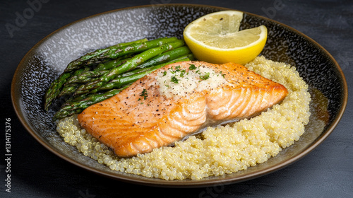 Pan-seared salmon with quinoa, asparagus, and lemon photo