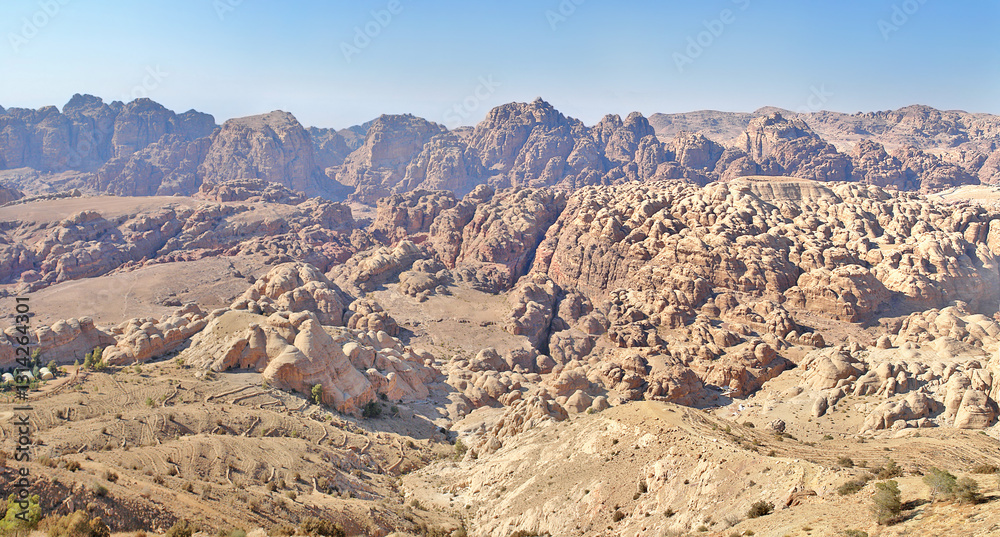 Naklejka premium View of the mountains hiding the rocky town of Petra