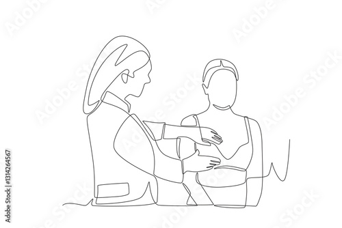 Doctor performs breast cancer examination on patient