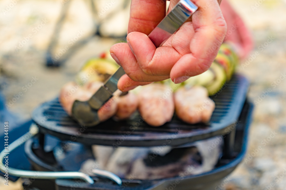 Grilled vegetables and meat on barbecue grill