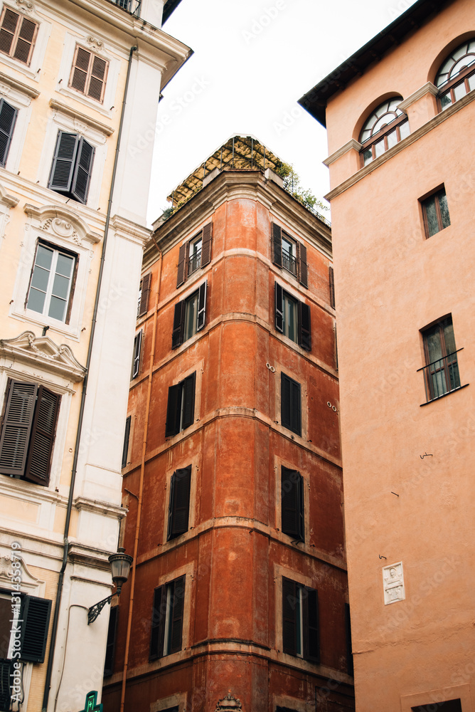 Three tall buildings and narrow streets between them Three tall buildings and narrow streets between them