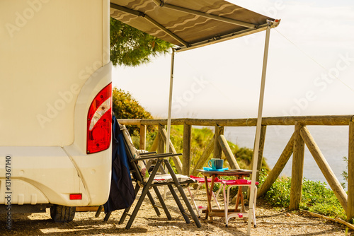 Obraz na płótnie Camper and chairs on sea shore w salonie