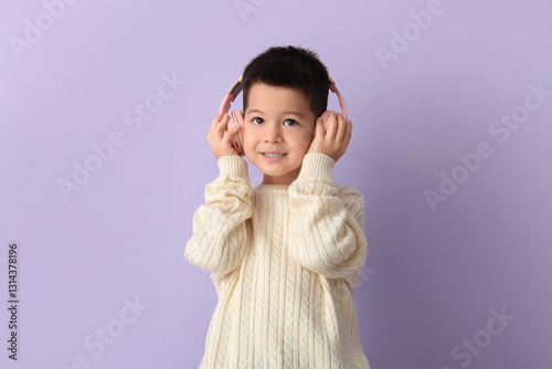 Cute little boy in headphon...