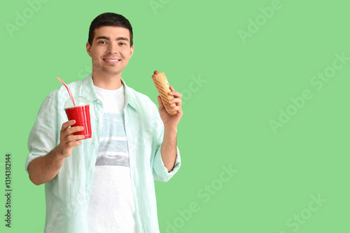 Happy young man with tasty ...