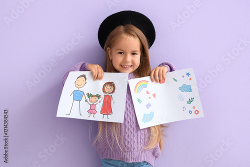 Cute little girl with drawi...