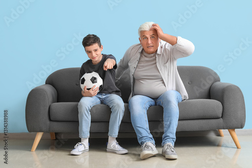 Little boy with his grandfa...