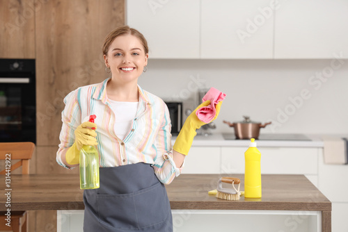 Female janitor with rag and...