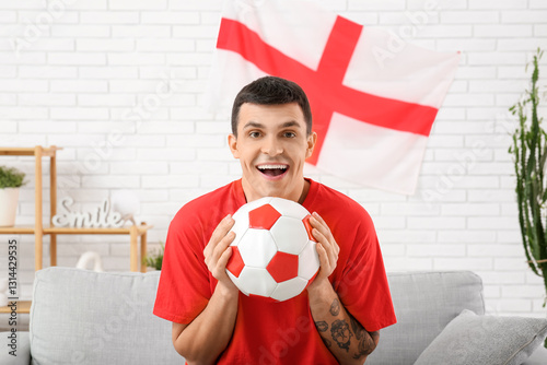 Young man with soccer ball ...
