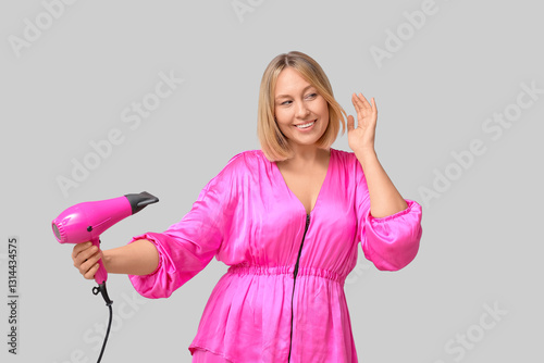 Happy young woman with bob ...