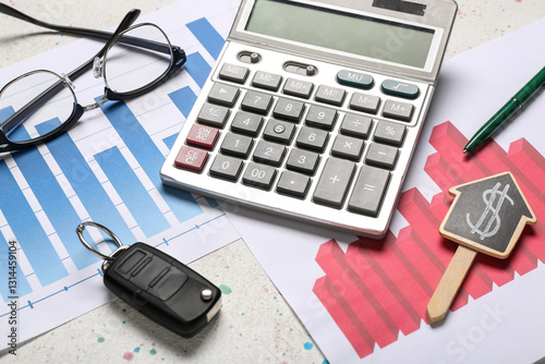 Calculator, eyeglasses and car key on white background. Debt concept. Closeup