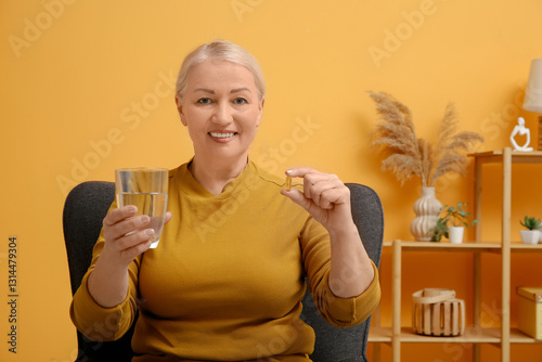 Mature woman with fish oil ...