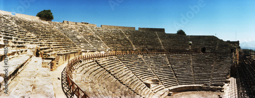 Panoramic view of the steps of the theatre in the ruins of Hierapolis, Pamukkale, Denizli Province, Turkey. photo