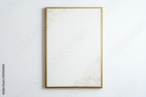 Modern vertical thin gold frame with blank white canvas against a soft gray wall in neutral tones