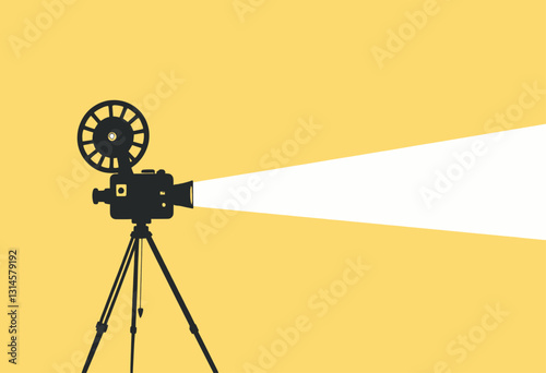 Vintage film projector with bright beam on yellow background