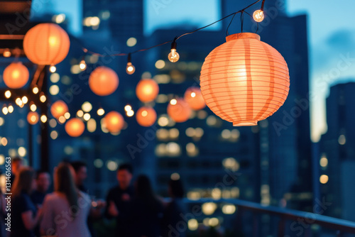 Evening rooftop gathering with Asian lanterns glowing warmly against a city skyline backdrop, creating a festive and intimate atmosphere.