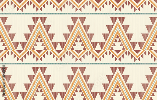 Geometric and ethnic Native American tribal patterns, featuring Aztec and Navajo motifs, create a seamless decorative texture. Design for background ,curtain, carpet, clothing, wrapping, Batik.