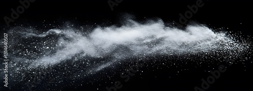 A tiny puff of transparent setting powder swirling in the air on an isolate background