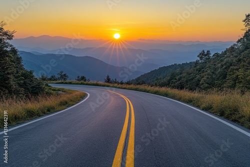 Obraz na płótnie Scenic mountain road at sunrise with vibrant sky and golden sunlight illuminating the winding asphalt and distant mountain range creating a peaceful landscape w salonie